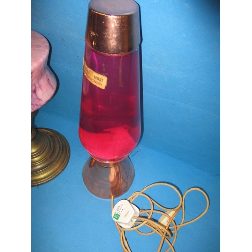 119 - A vintage lava lamp, not tested as to function and a twin burner oil lamp body and reservoir, all in... 