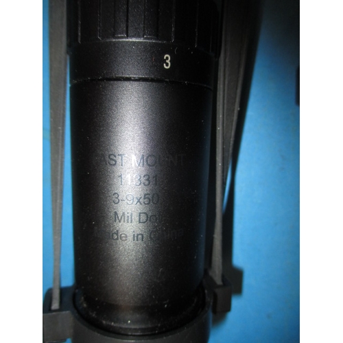 128 - A Hawk fast mount rifle scope 3-9x50, in box and a front mount bi-pod, both in used condition