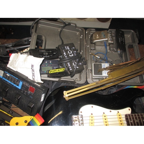 134 - An electric guitar, amp and numerous associated accessories, all in used condition and not tested as... 