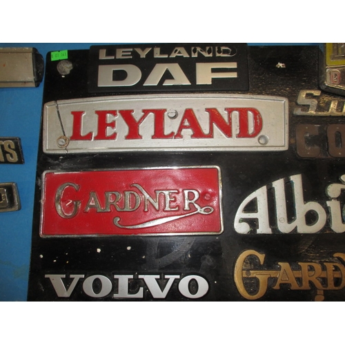 141 - A large collection of vintage vehicle model identification badges, to include numerous commercial ex... 