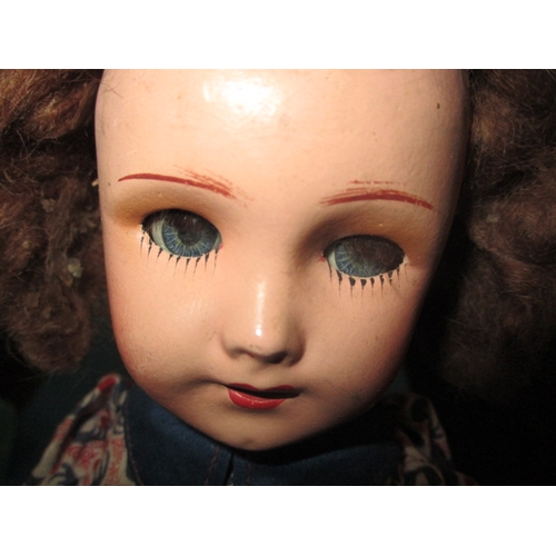 146 - A vintage French UNIS 301 bisque head doll with composite body, approx. height 35cm in good pre-owne... 