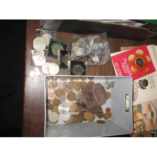 149 - A large quantity of collectors coins, to include Royal Mint year sets and silver proof examples