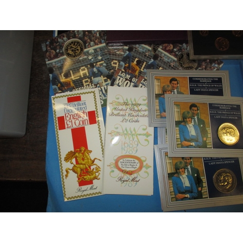 149 - A large quantity of collectors coins, to include Royal Mint year sets and silver proof examples