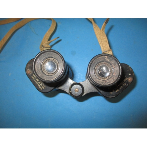 156 - A pair of WWII Taylor & Hobson binoculars with crows foot mark and dated 1943, in used condition