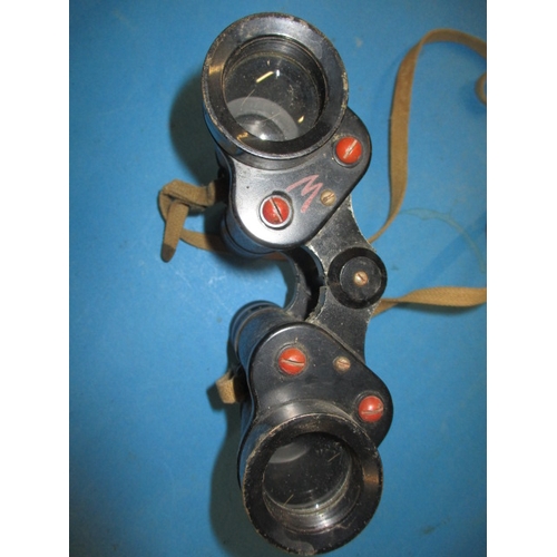 156 - A pair of WWII Taylor & Hobson binoculars with crows foot mark and dated 1943, in used condition