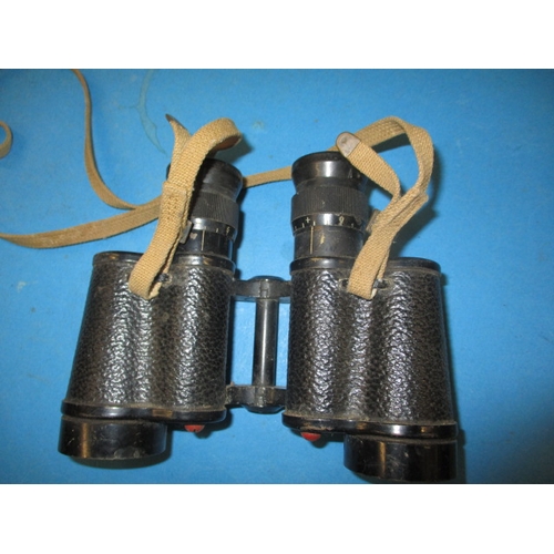 156 - A pair of WWII Taylor & Hobson binoculars with crows foot mark and dated 1943, in used condition