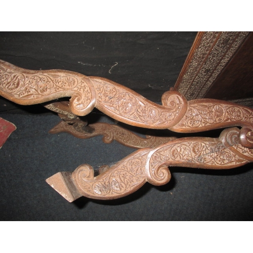 158 - A vintage Indian carved wood fold up tray table, useable but would benefit from some restoration, ap... 