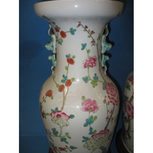 160 - A pair of large oriental vases, both made into lamp bases and on wood stands, approx. height on stan... 