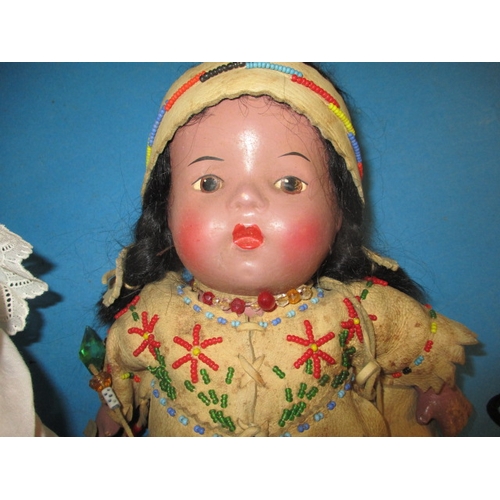 161 - A parcel of vintage dolls, to include a large German bisque head model, all in used condition