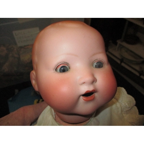 161 - A parcel of vintage dolls, to include a large German bisque head model, all in used condition