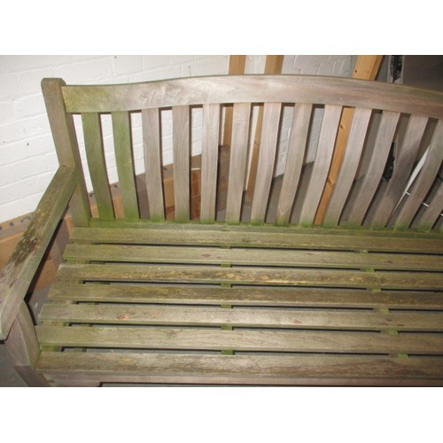 167 - A vintage teak garden bench, in useable pre-owned condition, approx. length 150cm