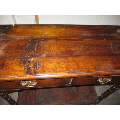 171 - A vintage oak lowboy, with frieze drawers and under-tier, in good useable pre-owned condition, appro... 