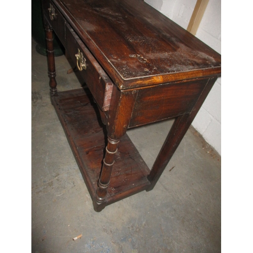 171 - A vintage oak lowboy, with frieze drawers and under-tier, in good useable pre-owned condition, appro... 