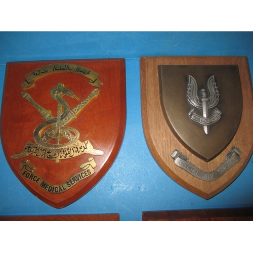 173 - Six military plaques on wood shields, some with labels verso stating obtained from NAAFI HQ, all fro... 