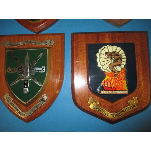 173 - Six military plaques on wood shields, some with labels verso stating obtained from NAAFI HQ, all fro... 