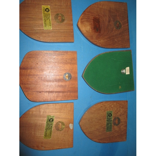 173 - Six military plaques on wood shields, some with labels verso stating obtained from NAAFI HQ, all fro... 