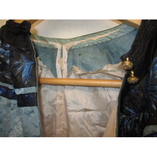 183 - A vintage Oriental silk jacket, in well used condition which would benefit from renovation