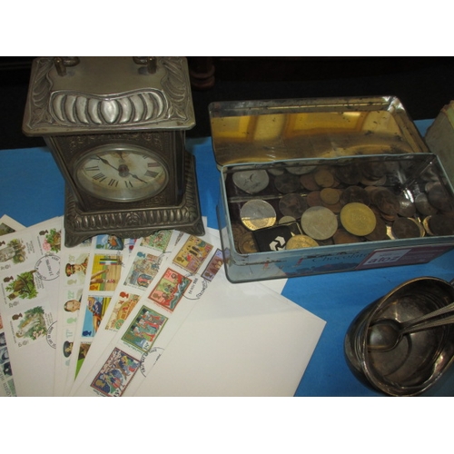 184 - A parcel of miscellaneous collectables, to include lighters, coins and a clock, all in used conditio... 