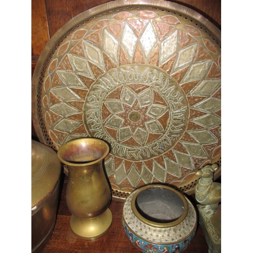 185 - A quantity of copper and brass items, to include Asian examples, all in used condition