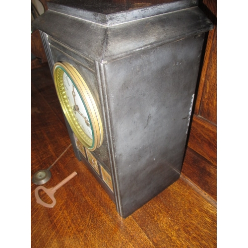 187 - A vintage slate mantle clock, approx. height 28cm, having key and pendulum, not tested as to functio... 