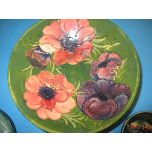 198 - Four pieces of vintage Moorcroft, to include a small lustre glazed dish. Various dates, all with no ... 