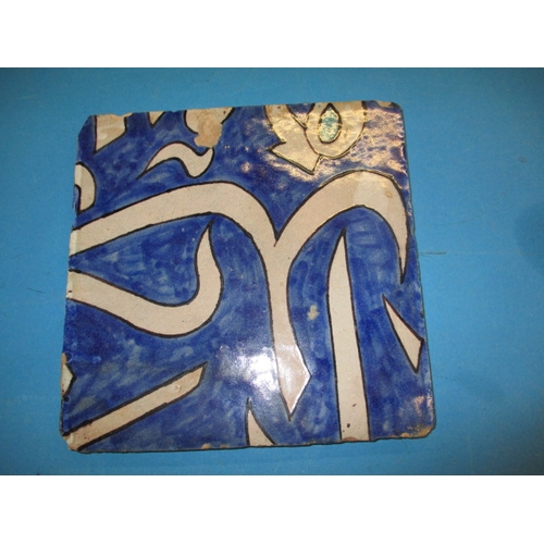 203 - 2 Antique Encaustic enamel tiles. Approximate size of largest 25cm x 24cm