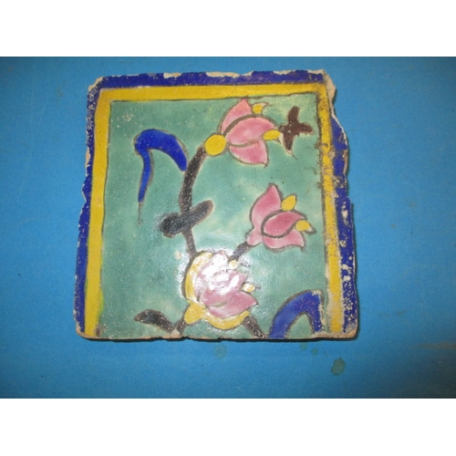 203 - 2 Antique Encaustic enamel tiles. Approximate size of largest 25cm x 24cm