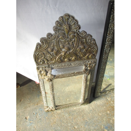 219 - 3 vintage Asian brass wall mirrors. Approximate size of largest 74cm x 48cm, some age related marks