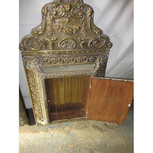 219 - 3 vintage Asian brass wall mirrors. Approximate size of largest 74cm x 48cm, some age related marks