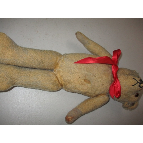 228 - 2 vintage plush teddy bears. Approximate length of largest 58cm. In well used condition