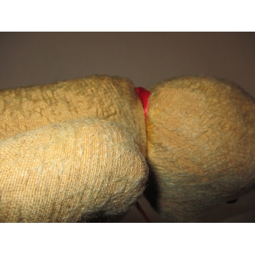 228 - 2 vintage plush teddy bears. Approximate length of largest 58cm. In well used condition