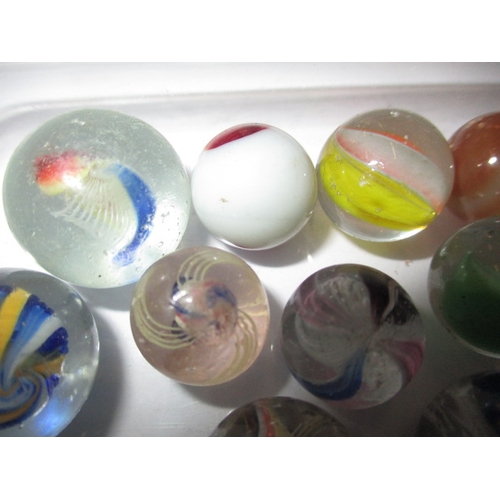 229 - A quantity of antique and later glass marbles, to include early 20th century American and hand blow ... 