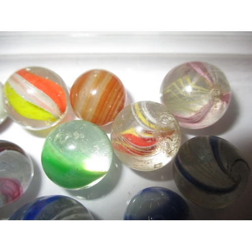 229 - A quantity of antique and later glass marbles, to include early 20th century American and hand blow ... 