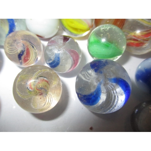 229 - A quantity of antique and later glass marbles, to include early 20th century American and hand blow ... 