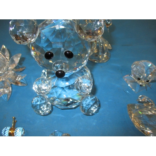 231 - A parcel of lead crystal glass ornaments, to include examples by Swarovski, all in used condition, o... 