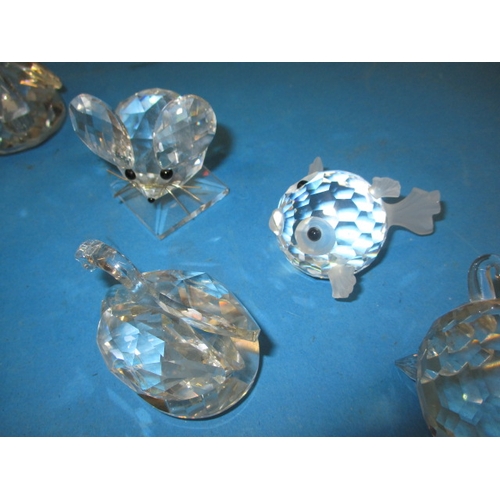 231 - A parcel of lead crystal glass ornaments, to include examples by Swarovski, all in used condition, o... 