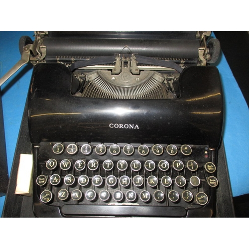 232 - A vintage Corona typewriter and a Columbia gramophone, both in used condition