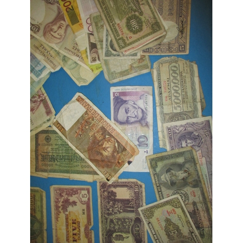 240 - A parcel of vintage world bank notes, to include WWII era invasion notes, all in well circulated con... 