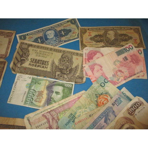 240 - A parcel of vintage world bank notes, to include WWII era invasion notes, all in well circulated con... 