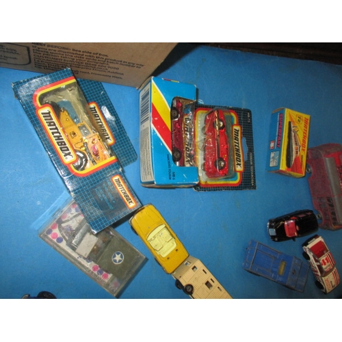 243 - A quantity of vintage die-cast model vehicles, all in play-worn condition