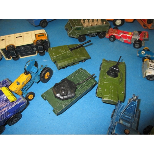 243 - A quantity of vintage die-cast model vehicles, all in play-worn condition