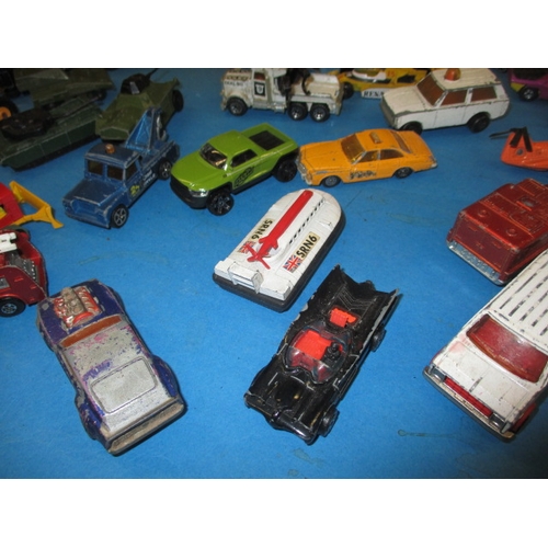 243 - A quantity of vintage die-cast model vehicles, all in play-worn condition