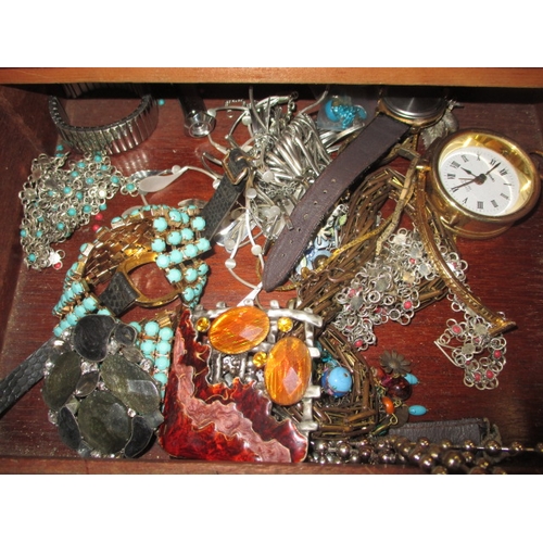 245 - A parcel of vintage costume jewellery in a vintage writing slope, all in used condition