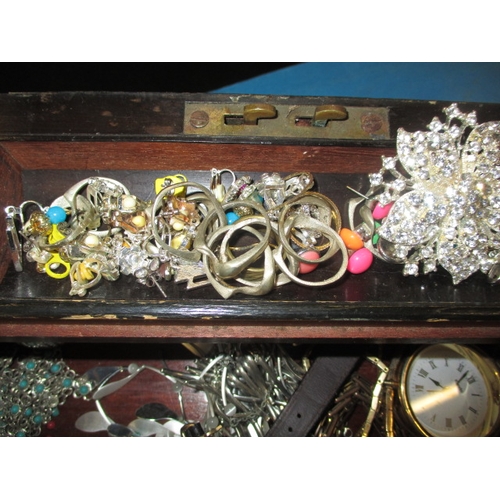 245 - A parcel of vintage costume jewellery in a vintage writing slope, all in used condition