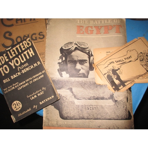 247 - A parcel of military related ephemera, all in well used condition