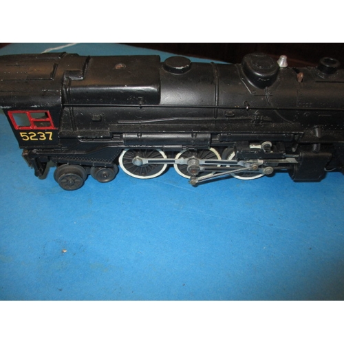 250 - A vintage Lionel Corporation ‘0’ gauge model railway locomotive, in used condition, approx. length 2... 