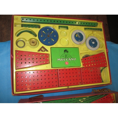 257 - A 1960’s Meccano box with part contents. In well used condition