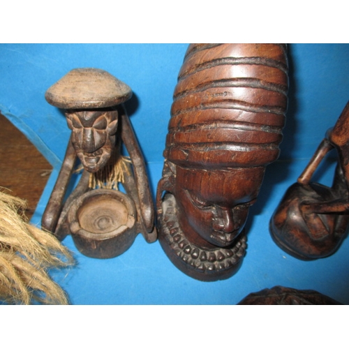 265 - A quantity of vintage carved wood tribal figures, all in used condition