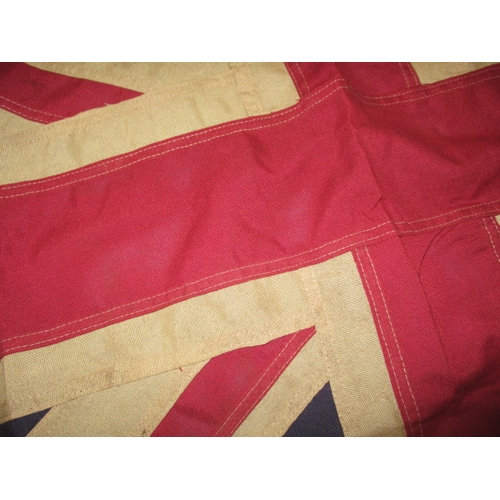 269 - A vintage union jack flag, the edge marked with crows foot and date of 1942, approx. size 92x59cm, h... 