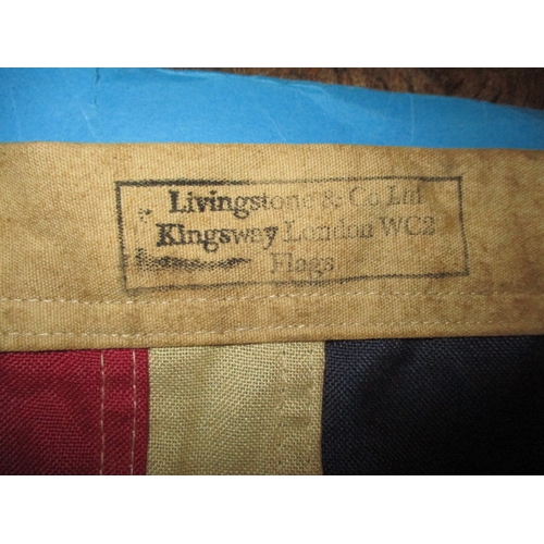 269 - A vintage union jack flag, the edge marked with crows foot and date of 1942, approx. size 92x59cm, h... 